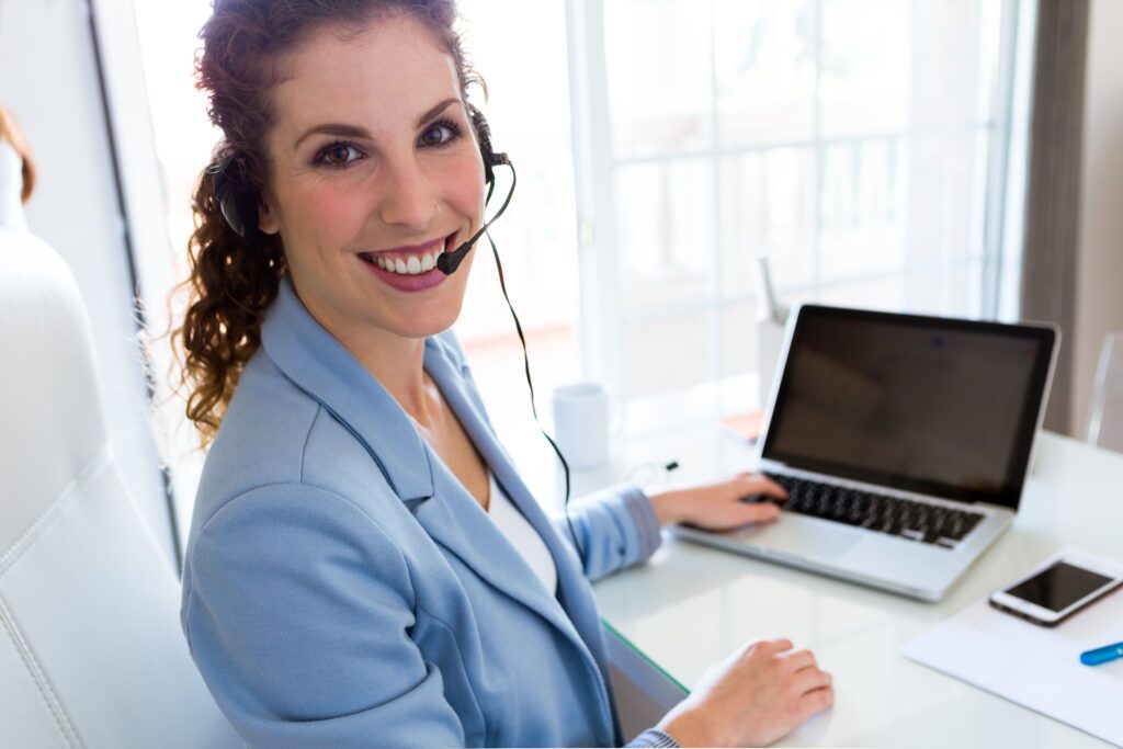 Why Real Estate Agencies Need Virtual Receptionists 1 real estate receptionist on phone