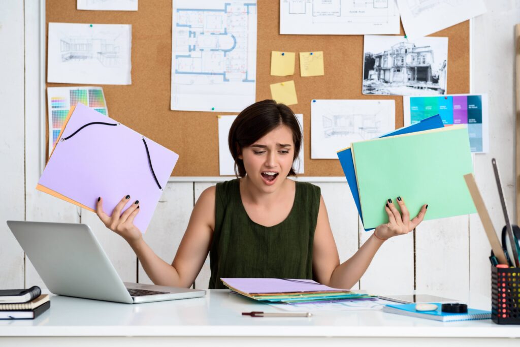 Why an Affordable Virtual Receptionist is a Smart Investment for Small Businesses 2 upset young beautiful businesswoman sitting workplace